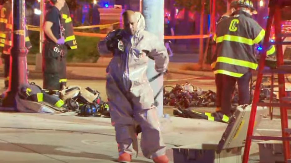 Twelve Cambridge, MA, firefighters suffered chemical burns while battling an apartment fire early Wednesday.