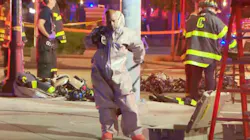 Twelve Cambridge, MA, firefighters suffered chemical burns while battling an apartment fire early Wednesday.