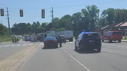 Four Concord, NC, firefighters were injured when their apparatus collided with a tractor-trailer while responding to a call Friday.
