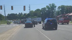 Four Concord, NC, firefighters were injured when their apparatus collided with a tractor-trailer while responding to a call Friday.