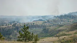 Five federal firefighters were hospitalized in stable condition after they were injured battling the Devil's Creek Fire in Garfield County, MT, on Thursday.