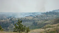 Five federal firefighters were hospitalized in stable condition after they were injured battling the Devil's Creek Fire in Garfield County, MT, on Thursday.