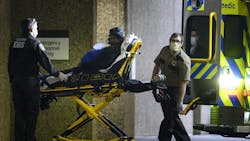 Hennepin, MN, EMS medics work in their old 'UPS brown' uniforms. Hennepin, MN, EMS medics work in their old 'UPS brown' uniforms.