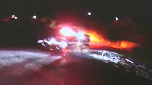 An inmate firefighter was injured after stealing an apparatus at the scene of a vegetation fire and then crashing the rig early Monday.