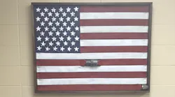 Napa, CA, firefighter Ryan Chagonjian has turned surplus hoselines into American flag artwork.