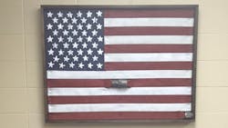 Napa, CA, firefighter Ryan Chagonjian has turned surplus hoselines into American flag artwork. Napa, CA, firefighter Ryan Chagonjian has turned surplus hoselines into American flag artwork.