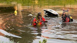 Naperville, IL, firefighters rescued a woman after her vehicle crashed into a retention pond Tuesday. Naperville, IL, firefighters rescued a woman after her vehicle crashed into a retention pond Tuesday.