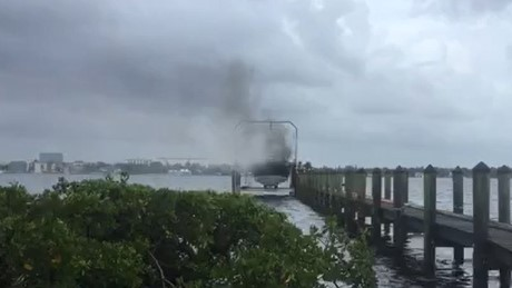 Firefighters used axes and chemical deterrents to put out a stubborn fire that broke out on a 32-foot boat on the Manatee River in Palmetto, FL, on Wednesday.