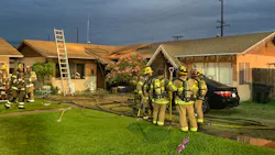 Orange County, CA, Fire Authority crews rescued an unconscious man from the bedroom of a burning duplex Sunday.