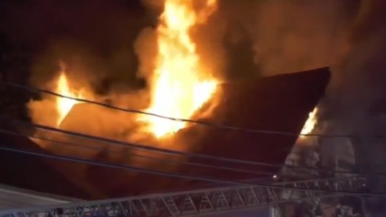 Three firefighters were injured battling a four-alarm fire in Teaneck, NJ, early Thursday that left two people dead.
