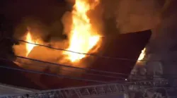Three firefighters were injured battling a four-alarm fire in Teaneck, NJ, early Thursday that left two people dead.