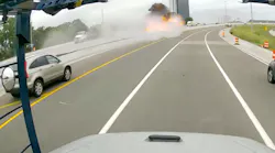 Troy, MI, firefighters battled a burning fuel tanker for more than two hours after it overturned and burst into flames along Interstate 75 on Monday.