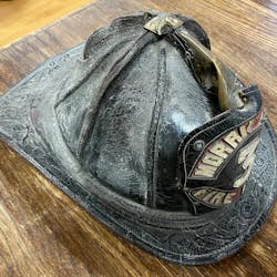 A 75-year-old Morris Plains, NJ, Fire Department helmet was recently discovered at a museum in Wasilla, AK, and it's a mystery as to how it got there and who it belonged to. A 75-year-old Morris Plains, NJ, Fire Department helmet was recently discovered at a museum in Wasilla, AK, and it's a mystery as to how it got there and who it belonged to.