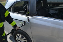 A lightweight exterior trim cover piece is removed to allow a better purchase point at the rear edge of a minivan sliding side door. A lightweight exterior trim cover piece is removed to allow a better purchase point at the rear edge of a minivan sliding side door.