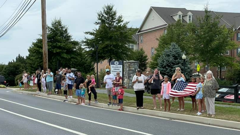 A ceremonial procession from the Office of the Chief Medical Examiner in Washington, D.C brought the body of fallen Frederick County Battalion Chief Joshua Laird to the Myers-Durboraw Funeral Home in Taneytown, MD.