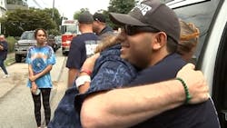 Belmont Hills, PA, firefighter receives a hug from his father after returning home from the hospital Thursday where he had been for weeks after being struck by an alleged drunken driver at a crash scene last month. Belmont Hills, PA, firefighter receives a hug from his father after returning home from the hospital Thursday where he had been for weeks after being struck by an alleged drunken driver at a crash scene last month.