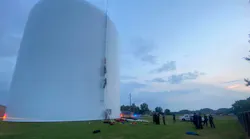 Athens, AL, firefighters rescued a woman who climbed into a 70-foot high water tank to swim Thursday.