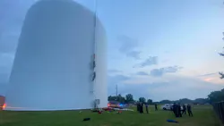 Athens, AL, firefighters rescued a woman who climbed into a 70-foot high water tank to swim Thursday. Athens, AL, firefighters rescued a woman who climbed into a 70-foot high water tank to swim Thursday.