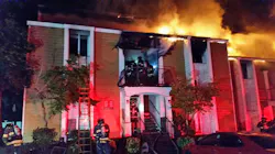 Bellevue, WA, firefighters rescued five people from a burning apartment complex near the Microsoft campus early Wednesday.