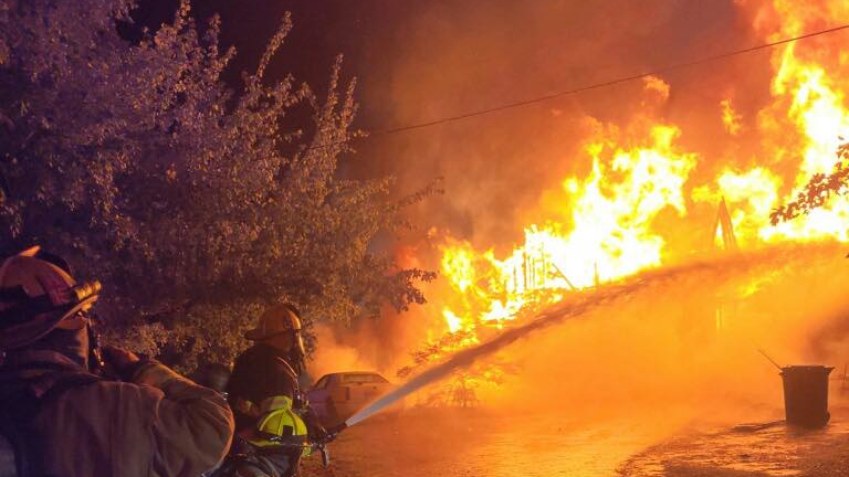 A Chesapeake, VA, firefighter suffered minor injuries battling a house fire that displaced nine people early Tuesday.