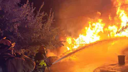 A Chesapeake, VA, firefighter suffered minor injuries battling a house fire that displaced nine people early Tuesday.