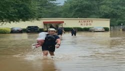 Cobb, GA, firefighters rescued 27 children and four adults from a flooded daycare center in Austell on Thursday.
