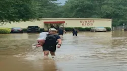 Cobb, GA, firefighters rescued 27 children and four adults from a flooded daycare center in Austell on Thursday.