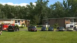 Firefighters rescued a critically injured woman who was trapped inside a burning apartment building in East Windsor, CT, on Monday.