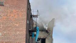 An explosion destroyed the roof of an apartment building in the Jackson Heights section of Queens on Tuesday, leaving one person dead. An explosion destroyed the roof of an apartment building in the Jackson Heights section of Queens on Tuesday, leaving one person dead.