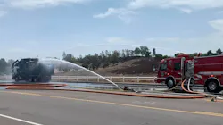 The explosion of a liquid propane tank on a burning garbage truck in Temecula, CA, severely damaged an apparatus and sent 12 firefighters to the hospital as a precaution Monday.