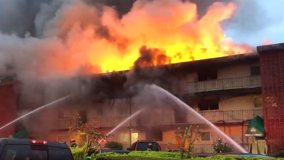 Firefighters battled a three-alarm fire that tore through a Tukwila, WA, apartment complex Tuesday.