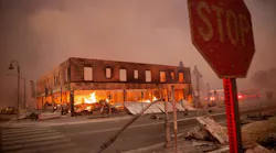 Buildings are left in ruin after the Dixie Fire tears through Greenville, CA, on Aug. 4, 2021.