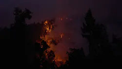 The Caldor Fire burns along a ridge close to Mormon Emigrant Trail on Aug. 19, 2021, in Pollock Pines, CA.