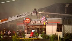Firefighters pour water on a four-alarm fire that engulfed the Weaver Nut Company warehouse in Lancaster County, PA, late Wednesday and early Thursday. Firefighters pour water on a four-alarm fire that engulfed the Weaver Nut Company warehouse in Lancaster County, PA, late Wednesday and early Thursday.