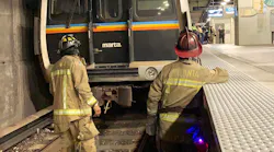 Atlanta firefighters rescued a man who was trapped under a MARTA rail system catwalk Wednesday.