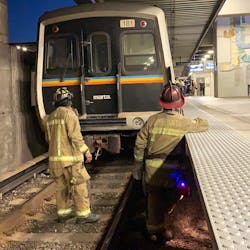 Atlanta firefighters rescued a man who was trapped under a MARTA rail system catwalk Wednesday. Atlanta firefighters rescued a man who was trapped under a MARTA rail system catwalk Wednesday.