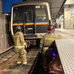 Atlanta firefighters rescued a man who was trapped under a MARTA rail system catwalk Wednesday. Atlanta firefighters rescued a man who was trapped under a MARTA rail system catwalk Wednesday.