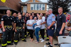FDNY firefighters and family help Liam Dominguez Rodriguez celebrate his third birthday. The firefighters rescued the boy from an arson fire. FDNY firefighters and family help Liam Dominguez Rodriguez celebrate his third birthday. The firefighters rescued the boy from an arson fire.