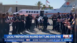 Firefighters line up to greet the injured CAL FIRE San Diego County captain after he was released from the hospital.
