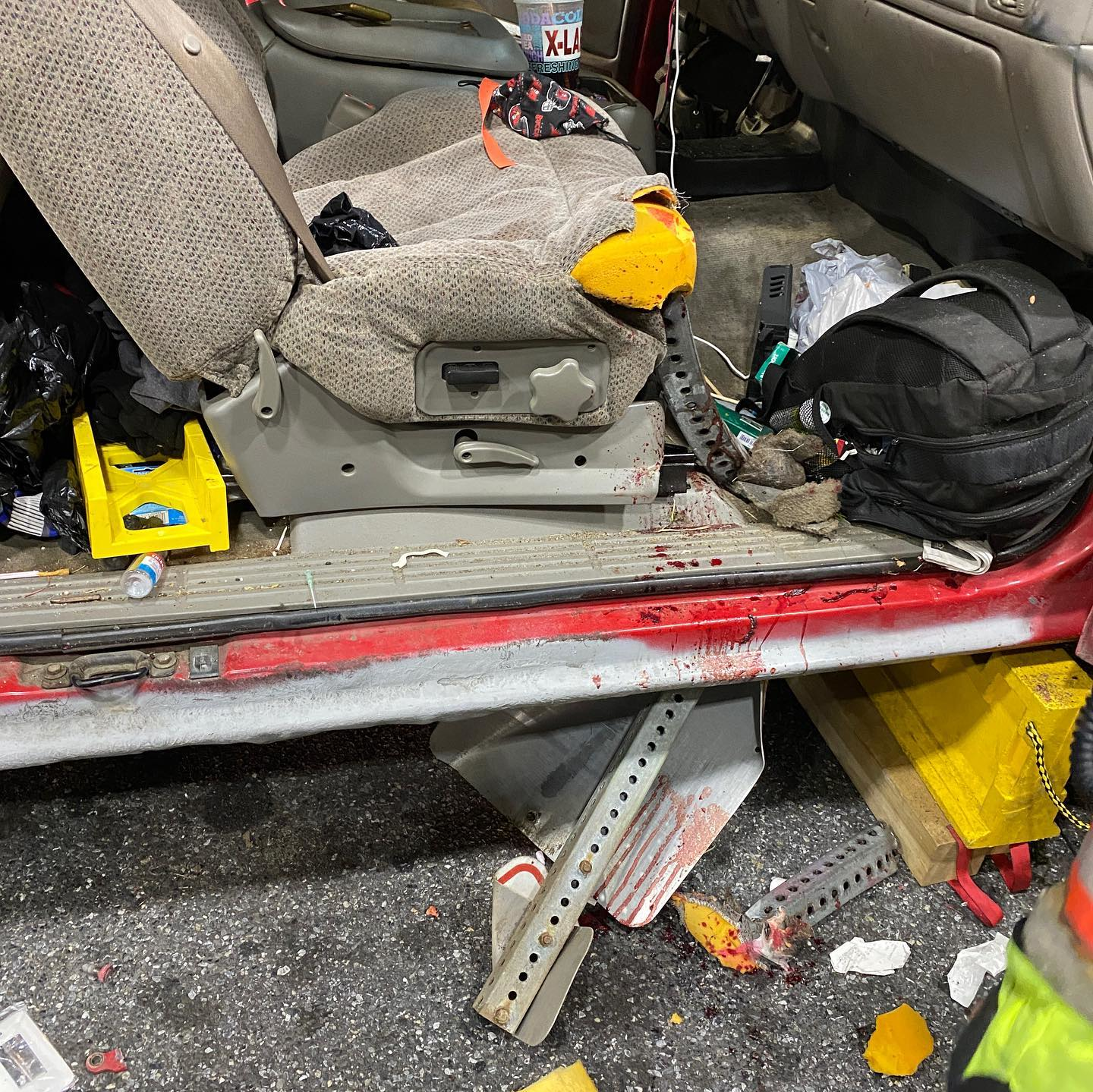 Firefighters stabilized the vehicle before using O-cutters to cut the sign post above and below the patient and removed the vehicle's doors for total access.