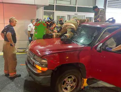 Dover firefighters worked with Kent County EMS and hospital staff to stabilize the patient before cutting the sign post around the patient.