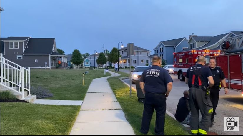 South Bend firefighters were working a call when several men videotaped their actions.