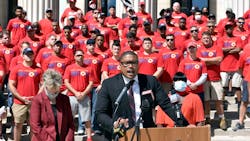 Springfield, MA, city councilor Justin Hurst speaks during a press conference on the steps of City Hall in support of firefighters getting merit pay for frontline workers.