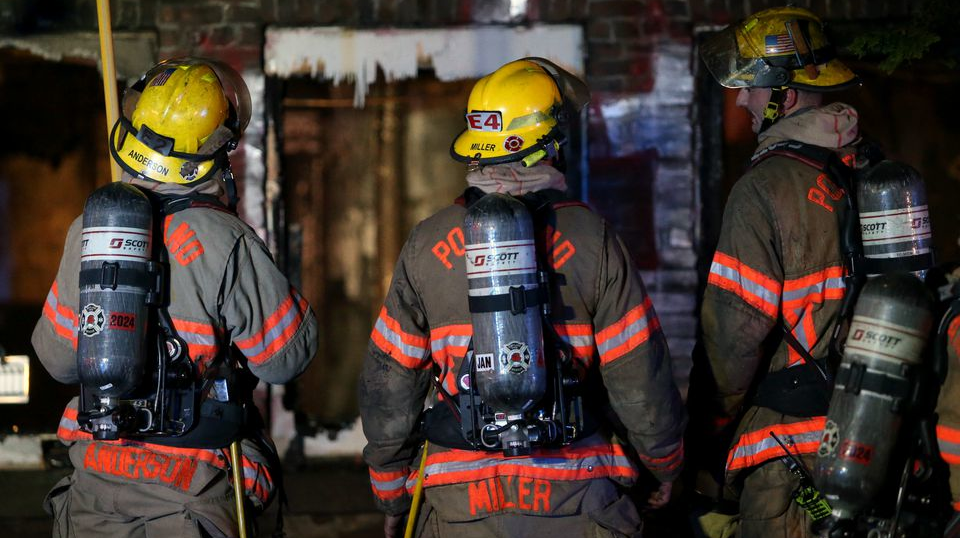 Portland, OR, firefighters at the scene of a residential fire in September 2020.
