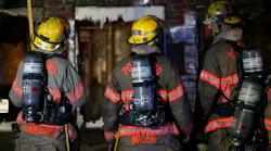 Portland, OR, firefighters at the scene of a residential fire in September 2020.