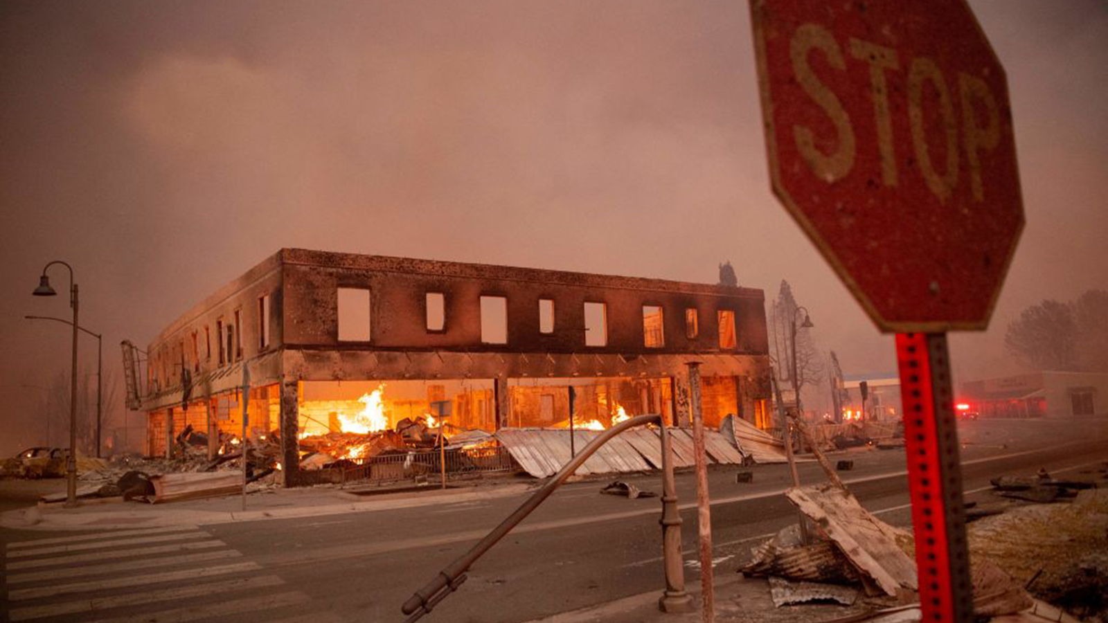 Buildings are left in ruins as the Dixie fire tears through Greenville, CA, on Aug. 4, 2021.