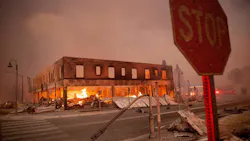 Buildings are left in ruins as the Dixie fire tears through Greenville, CA, on Aug. 4, 2021.