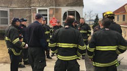 Worcester firefighters talk during an RIT training session in February 2018. Worcester firefighters talk during an RIT training session in February 2018.