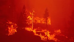 Flames consume a mountain home as the Caldor Fire pushes into South Lake Tahoe, CA, on Aug. 30, 2021. Flames consume a mountain home as the Caldor Fire pushes into South Lake Tahoe, CA, on Aug. 30, 2021.