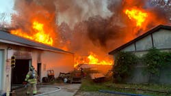 Fire was visible from a small garage and was spreading to a large pole barn when Grand Traverse firefighters arrived. Fire was visible from a small garage and was spreading to a large pole barn when Grand Traverse firefighters arrived.